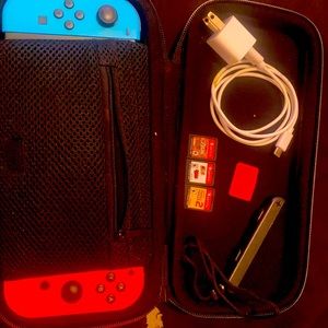 Nintendo switch with 3 games complete charging Base and cable charger